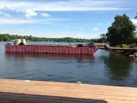 1990 60’ x 16’ x 6’ Steel Deck Barge with Ramps, Spud wells and Spuds