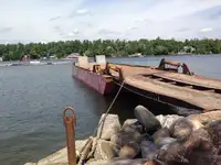 1990 60’ x 16’ x 6’ Steel Deck Barge with Ramps, Spud wells and Spuds